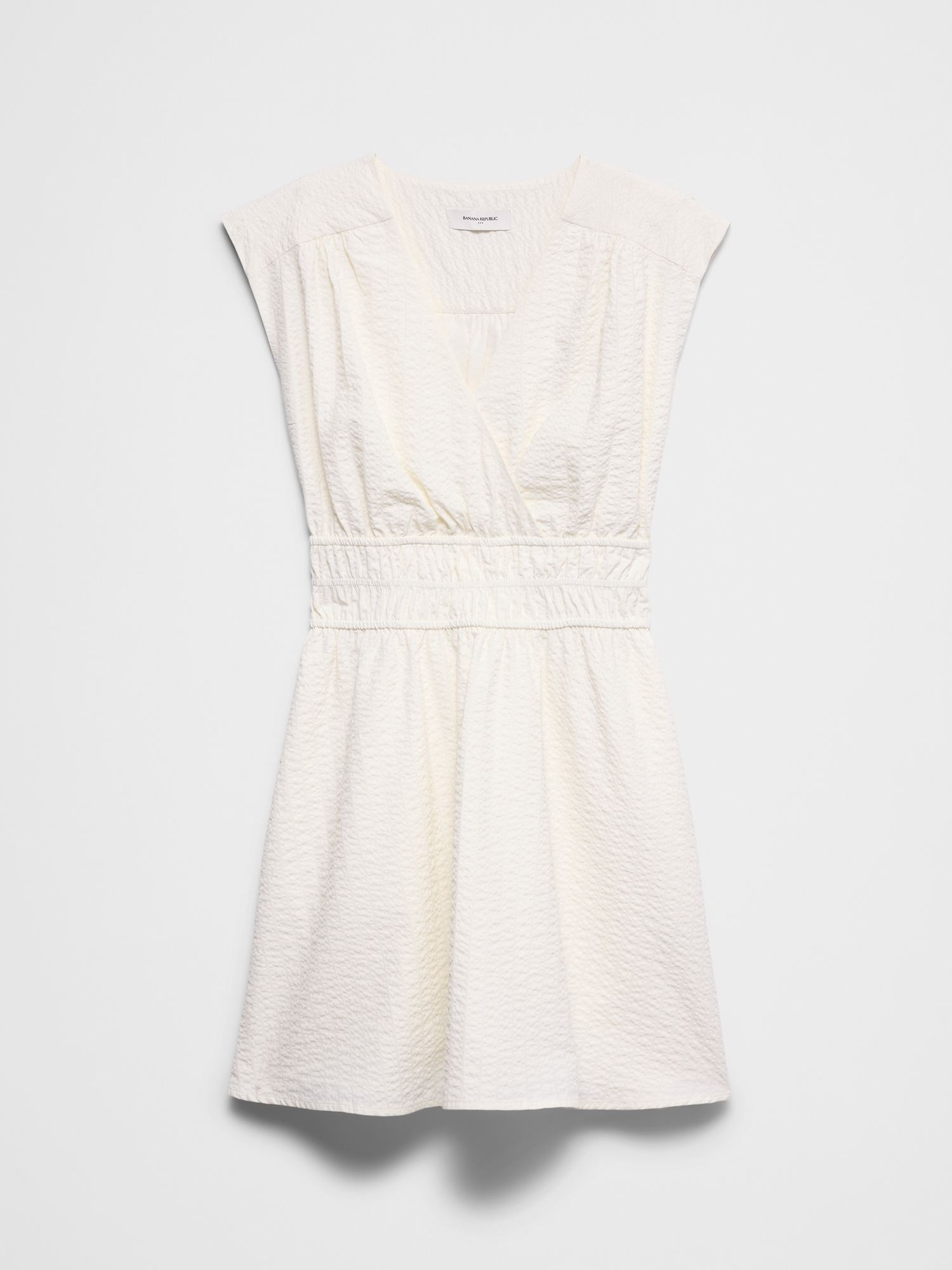 L'image numéro 4 présente Robe courte en tissu gaufré