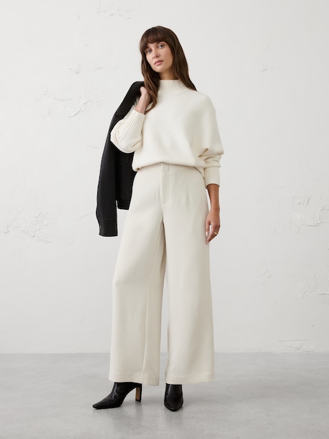 PANTALON PLISSÉ À JAMBE LARGE ET TAILLE HAUTE EN CRÊPE
